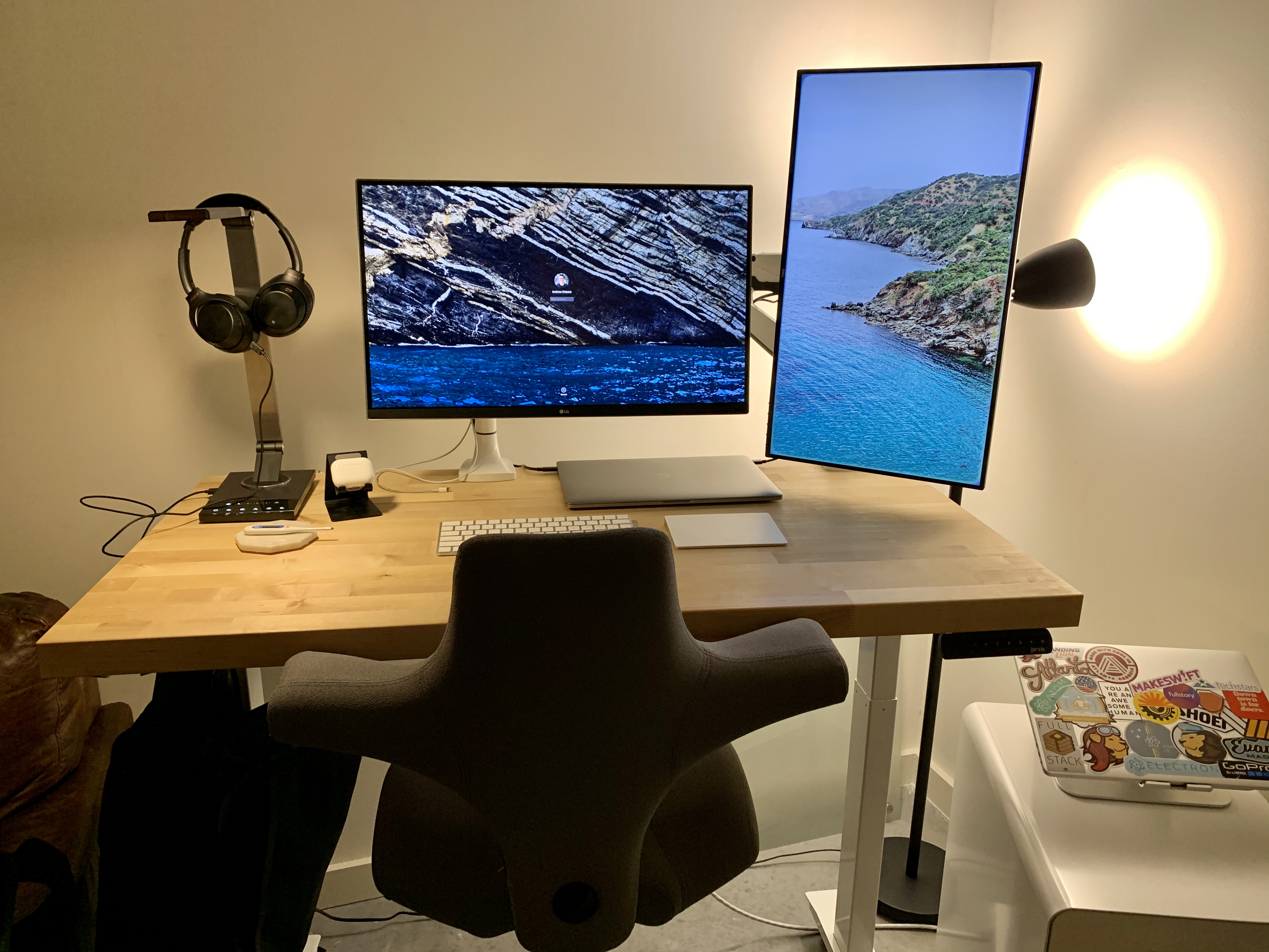 Dual monitor work station with illuminating light